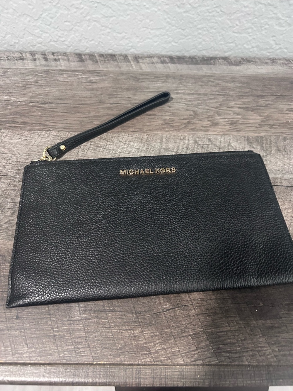 Like new Michael Kors Black Leather Wristlet Clutch